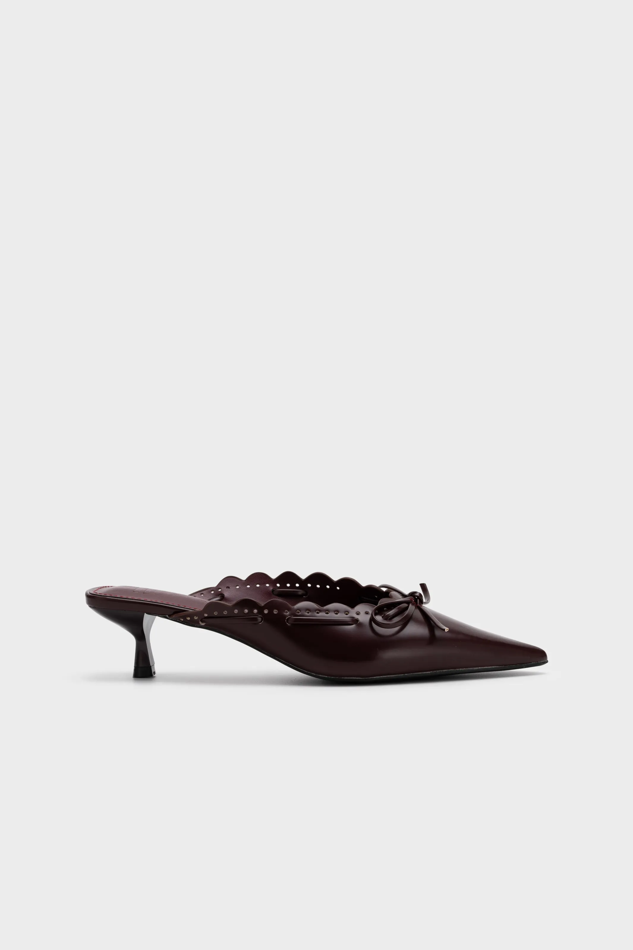 PERFORATED HEEL MULE WITH BOW