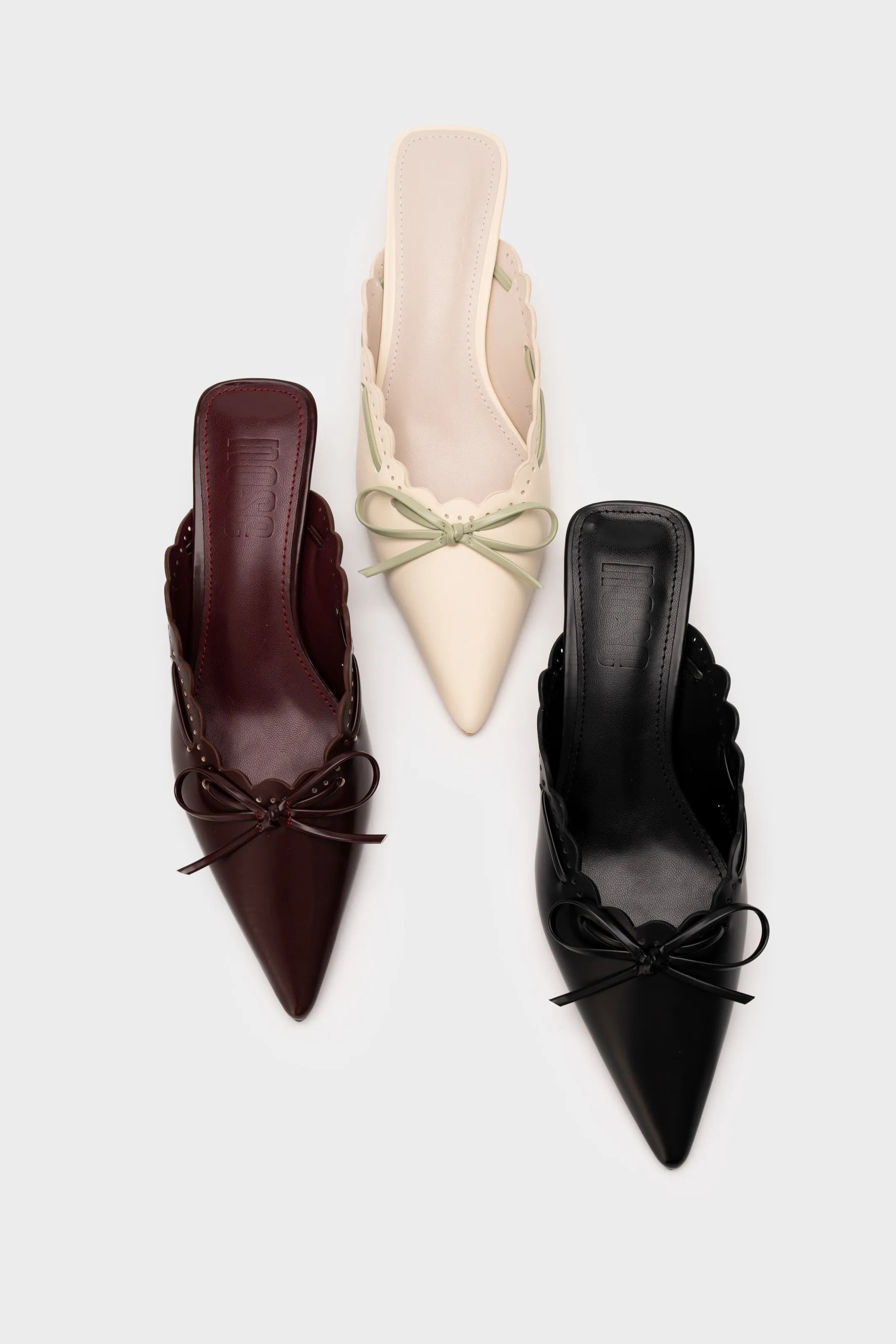 PERFORATED HEEL MULE WITH BOW