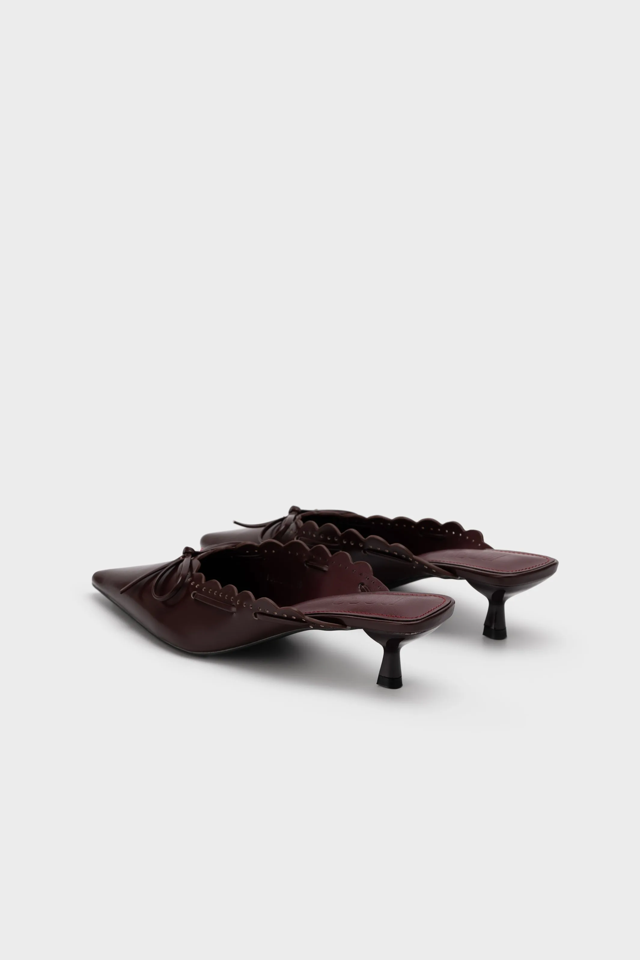 PERFORATED HEEL MULE WITH BOW